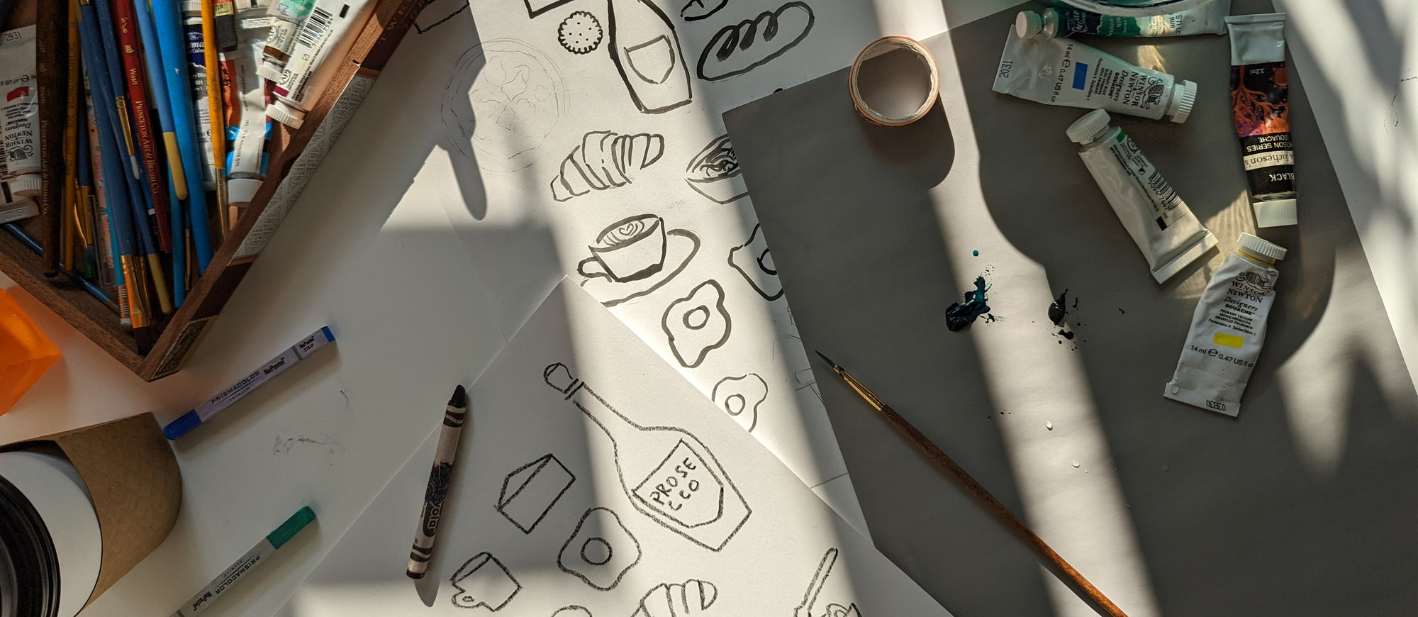 Art supplies with a latte