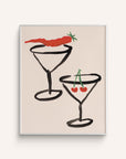 Hand-painted art print featuring two martini glasses, one with a red chili, and one with two cherries on a white background.