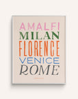 An art print titled “Italian Cities” displaying the names of five popular Italian Cities written in various colors and fonts. The cities are Amalfi, Milan, Florence, Venice and Rome on a white background.