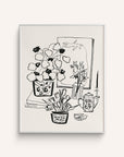 Black and white still life featuring tulips, a steaming cup of tea, a painting of a tomato, books, and a cup on a white background.
